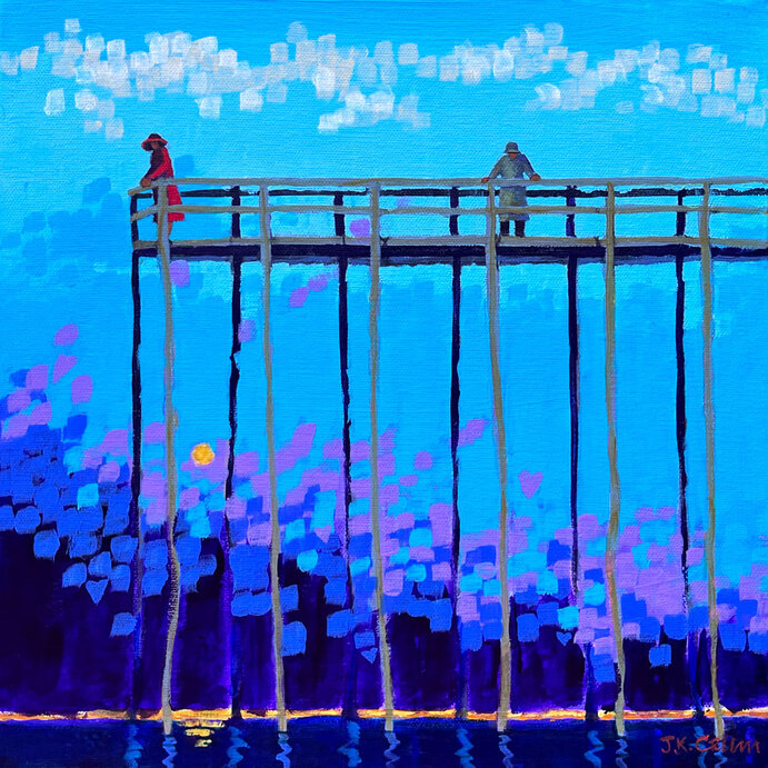 Loving couple standing on old dock